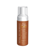 Fleur De Mer tanning mousse in brown pump bottle and FDM logo on front