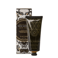 MOR Snow Gardenia hand cream in black tube with gold flowers