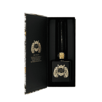 MOR belladonna diffuser open box showing black glass vessel with black reed sticks