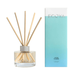 ECOYA lotus diffuser in small 50ml size. Diffuser with 5 reed sticks with aqua outer box next to it