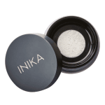 INIKA Organic setting powder shown with lid off in black tub