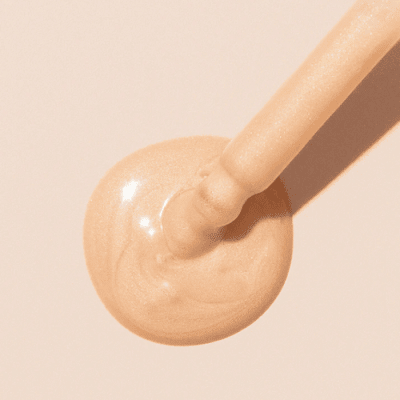 INIKA radiant glow veil liquid with dropper. Beige in colour