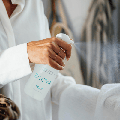 ECOYA laundry spray with mist on white clothes