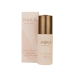 inika face oil beside box.
