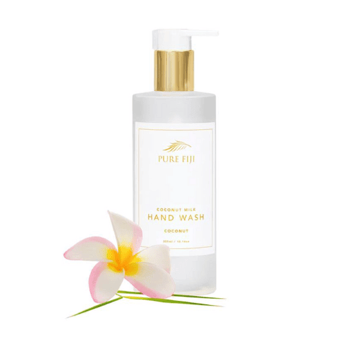 Pure Fiji hand wash in white bottle with pump. 300ml size with a frangipani flower next to the bottle