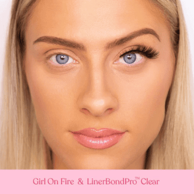 Model wearing Silly George Girl On Fire lash on one eye to show the look