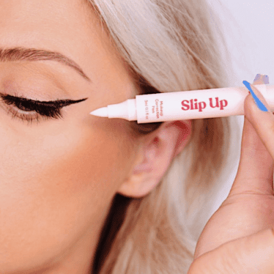 Silly George Slip Up Makeup Correction Pen being used on an eye with liner