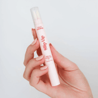 Silly George Slip Up Makeup Correction Pen held in hand