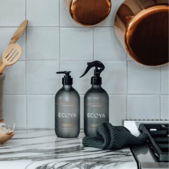 ECOYA Tahitian Lime & Grapefruit Kitchen dish liquid pictured with the surface spray. On a kitchen bench