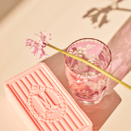 mor marshmallow soap with a glass jar and flower